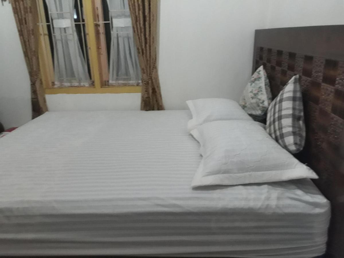 Bumimi Homestay Painan Buitenkant foto